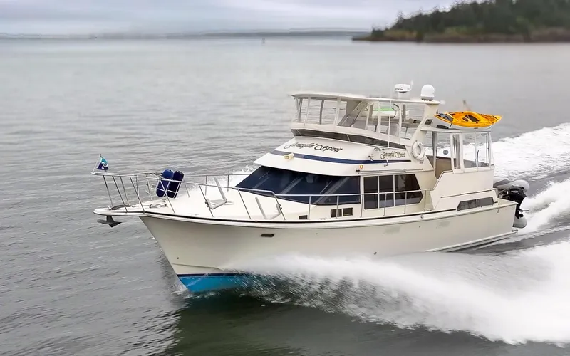 Graceful Spirit Yacht Photos Pics 1990 Tollycraft 44 Cockpit Motor Yacht cruising on open water.