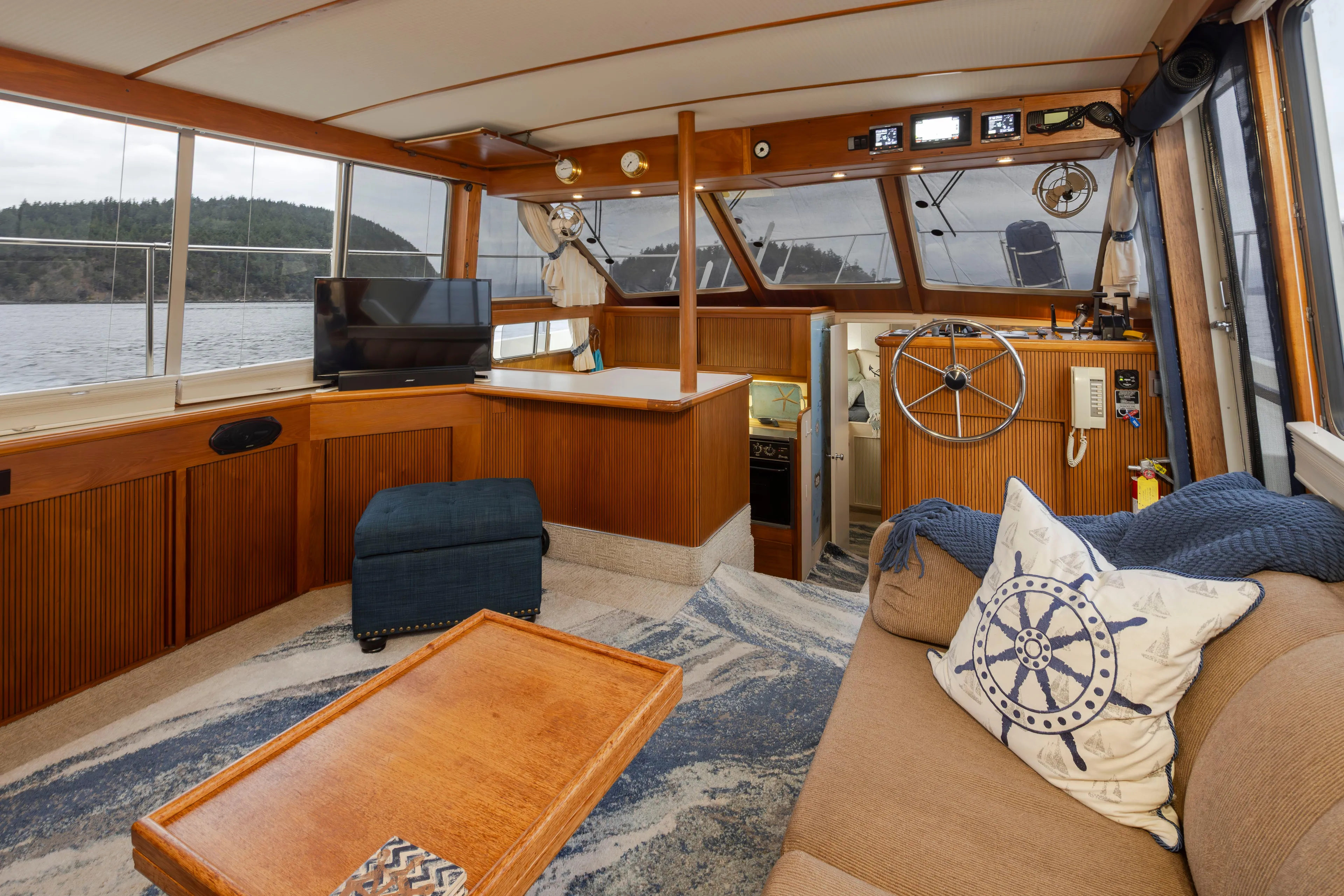 Graceful Spirit Yacht Photos Pics Interior of 1990 Tollycraft 44 Cockpit Motor Yacht with cozy seating and helm.