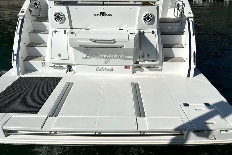 2021 Cruisers Yachts 50 Cantius Yacht Photos Pics 2021 Cruisers Yachts 50 Cantius stern view with swim platform and steps.