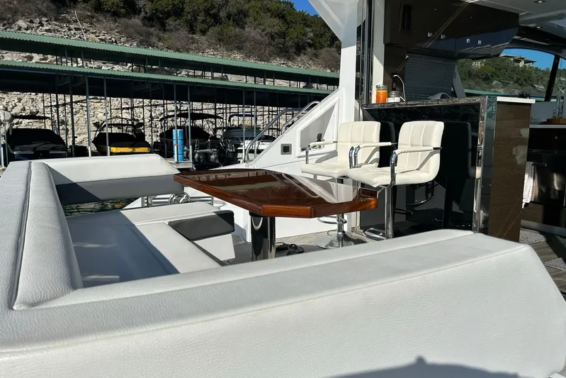 2021 Cruisers Yachts 50 Cantius Yacht Photos Pics Luxurious 2021 Cruisers Yachts 50 Cantius with elegant seating and dining area.