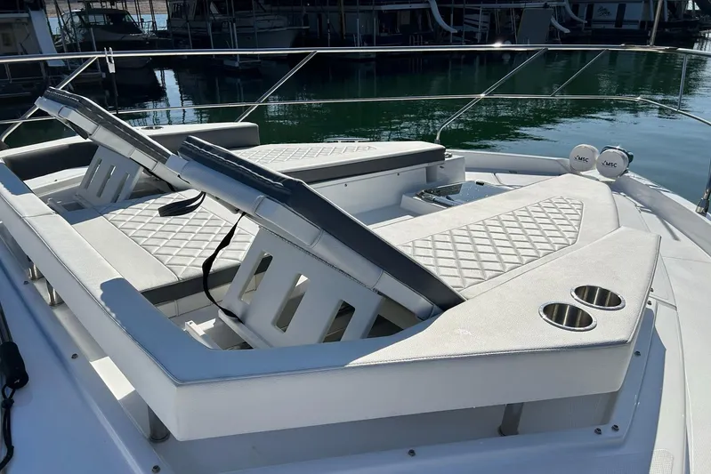 2021 Cruisers Yachts 50 Cantius Yacht Photos Pics 2021 Cruisers Yachts 50 Cantius with luxurious sun loungers and cup holders on deck.