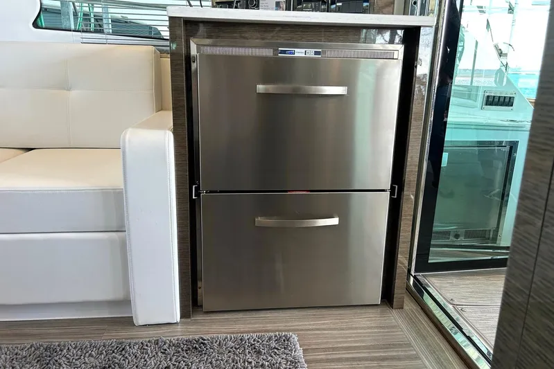 2021 Cruisers Yachts 50 Cantius Yacht Photos Pics Stainless steel refrigerator in 2021 Cruisers Yachts 50 Cantius interior.