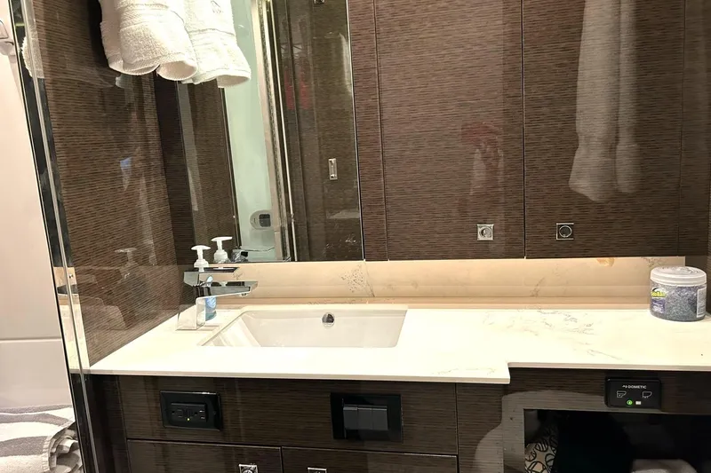 2021 Cruisers Yachts 50 Cantius Yacht Photos Pics Luxurious bathroom interior of 2021 Cruisers Yachts 50 Cantius with modern fixtures.