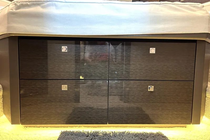 2021 Cruisers Yachts 50 Cantius Yacht Photos Pics Luxurious interior of 2021 Cruisers Yachts 50 Cantius with sleek wooden cabinetry.