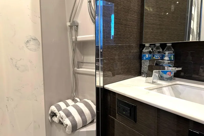 2021 Cruisers Yachts 50 Cantius Yacht Photos Pics Luxurious bathroom in 2021 Cruisers Yachts 50 Cantius with modern fixtures and amenities.