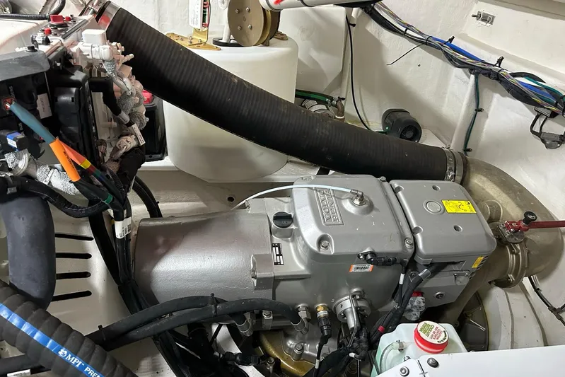 2021 Cruisers Yachts 50 Cantius Yacht Photos Pics Engine room of 2021 Cruisers Yachts 50 Cantius, showcasing mechanical components and wiring.