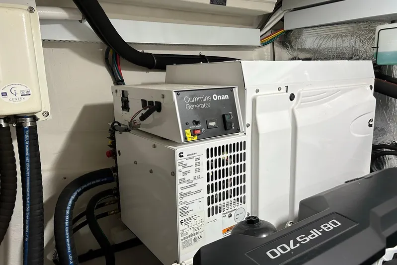 2021 Cruisers Yachts 50 Cantius Yacht Photos Pics Cummins Onan generator in 2021 Cruisers Yachts 50 Cantius engine room.