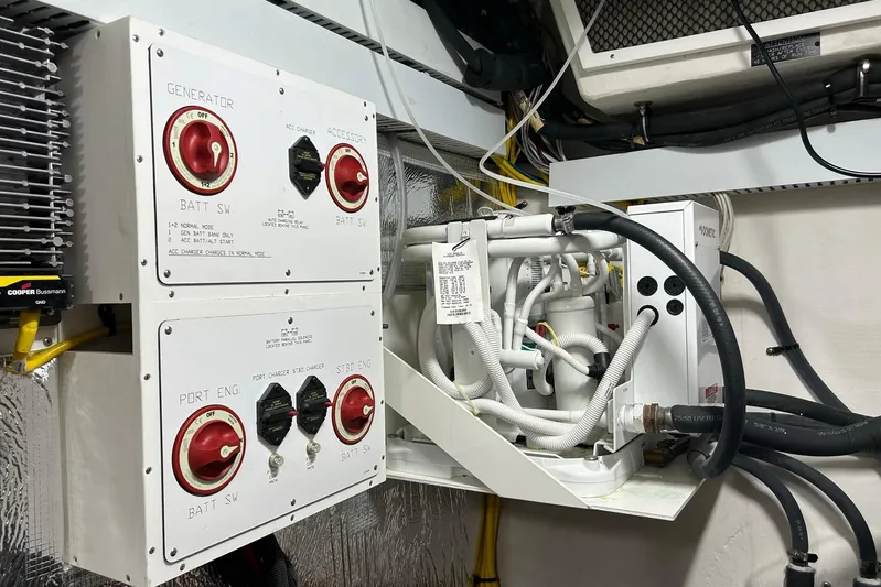 2021 Cruisers Yachts 50 Cantius Yacht Photos Pics Electrical system of 2021 Cruisers Yachts 50 Cantius, featuring battery switches and wiring.