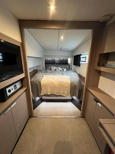 Elba 45 Yacht Photos Pics Luxurious bedroom interior of 2021 Fountaine Pajot Catamaran Elba 45 with modern amenities.