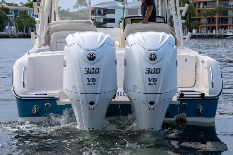  Yacht Photos Pics 2022 Grady-White Freedom 285 boat with twin Yamaha 300 V6 engines on water.