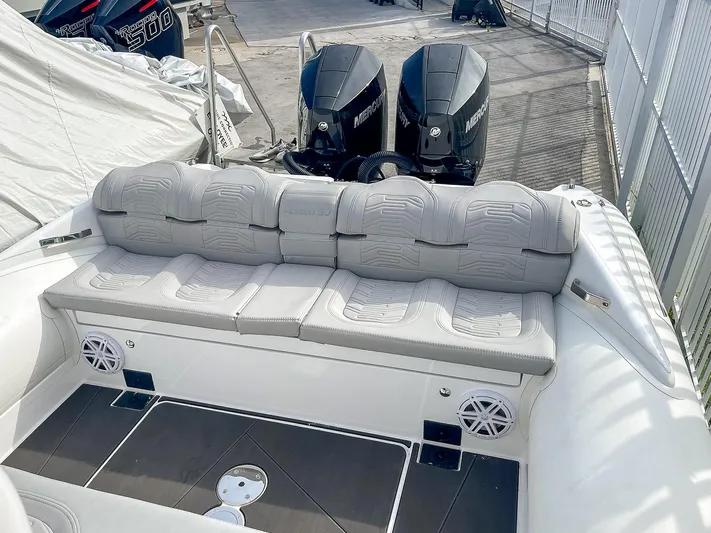  Yacht Photos Pics 2025 Ribco Venom 30 boat with cushioned seating and dual outboard motors.