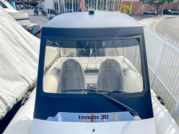  Yacht Photos Pics 2025 Ribco Venom 30 boat with sleek design and modern cockpit.