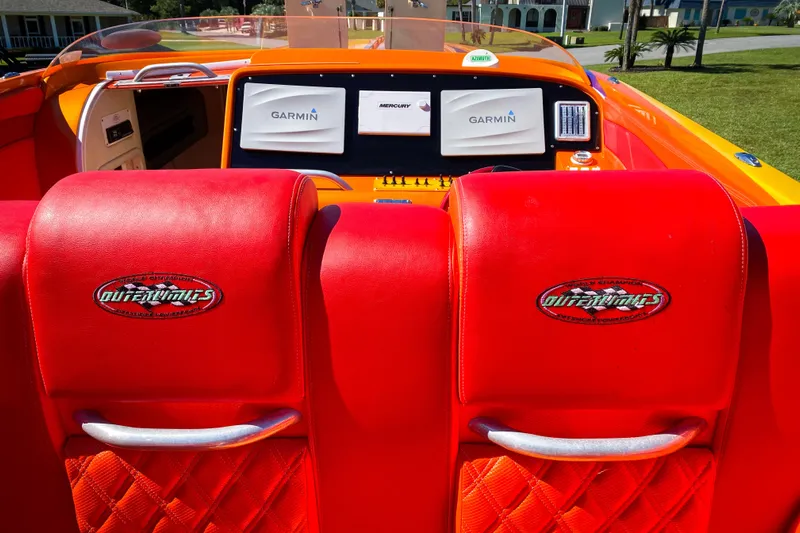  Yacht Photos Pics Red interior of 2005 Outerlimits 51 Sport Yacht with Garmin navigation displays.