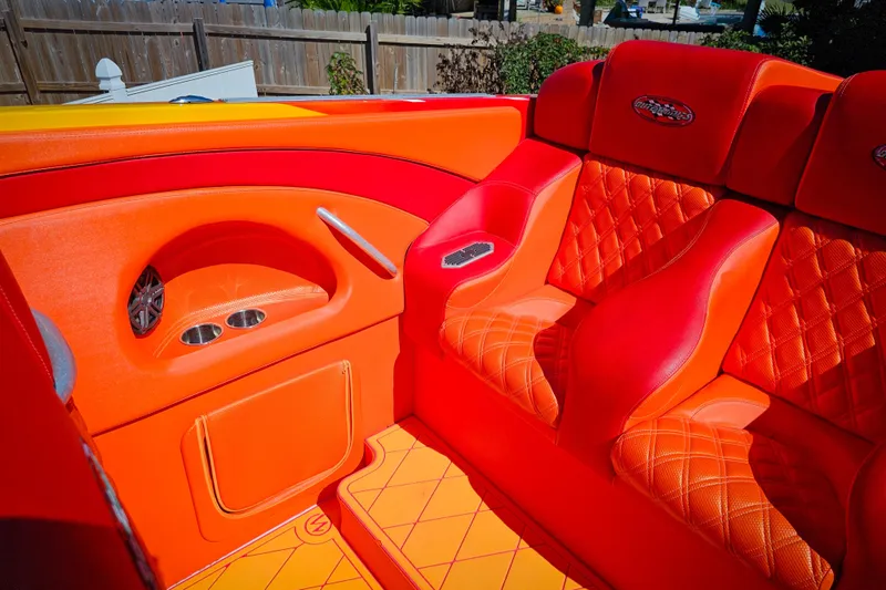  Yacht Photos Pics Luxurious orange and red interior of a 2005 Outerlimits 51 Sport Yacht.