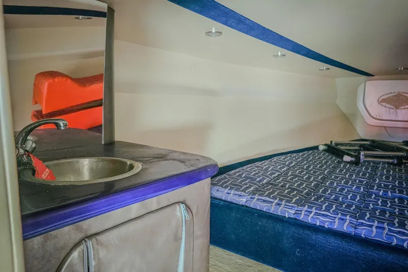  Yacht Photos Pics Interior of 2005 Outerlimits 51 Sport Yacht with sink and bed.