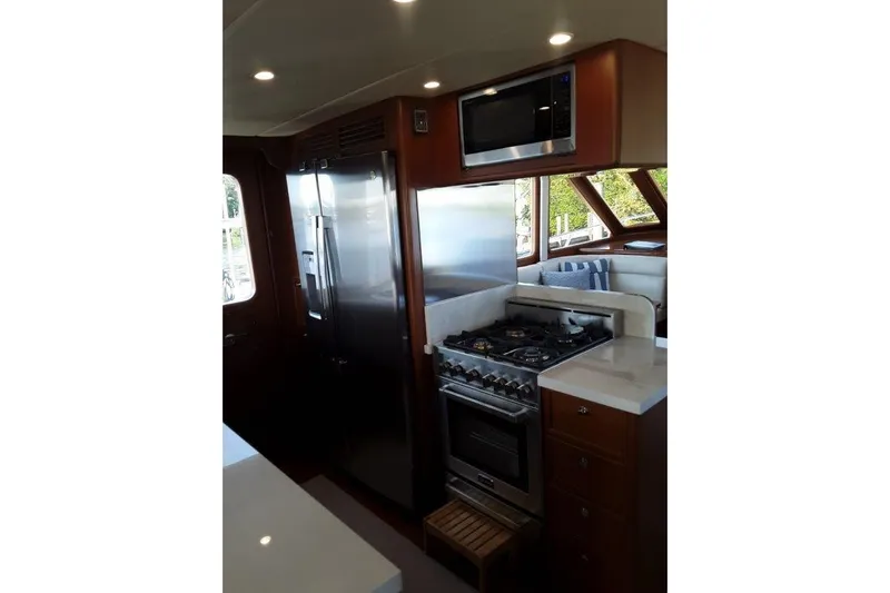 Endless Summer Yacht Photos Pics Luxurious kitchen interior with propane stove and oven.