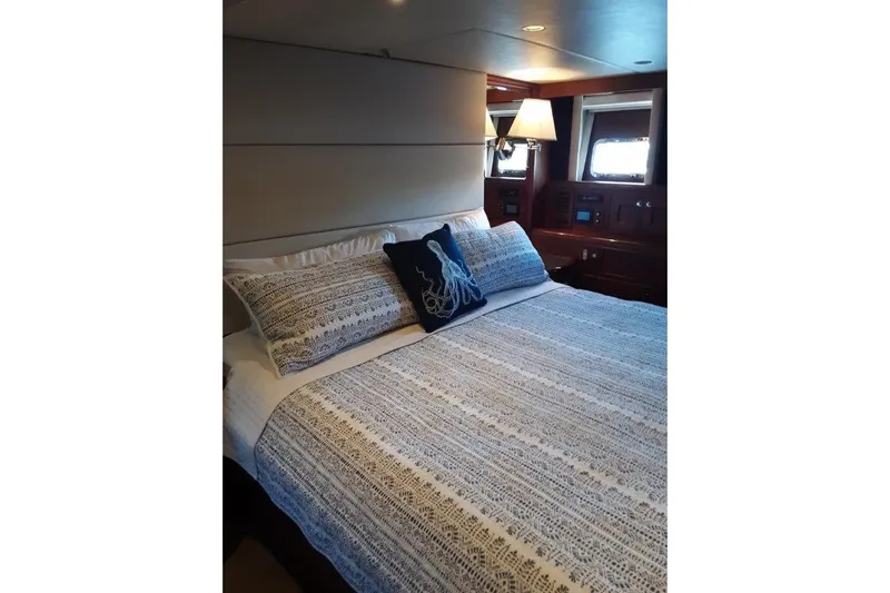 Endless Summer Yacht Photos Pics Master Stateroom with king bed and elegant bedding and additional new lighting.