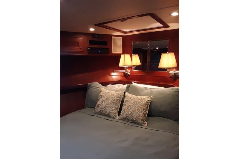 Endless Summer Yacht Photos Pics VIP stateroom forward with queen bed and elegant lighting and decor.
