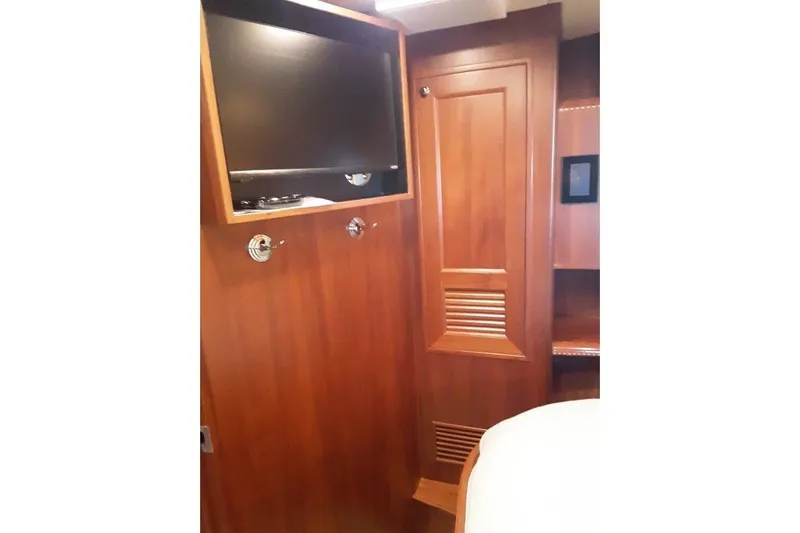 Endless Summer Yacht Photos Pics Aft VIP stateroom with mounted TV. This room has full access to the engine room