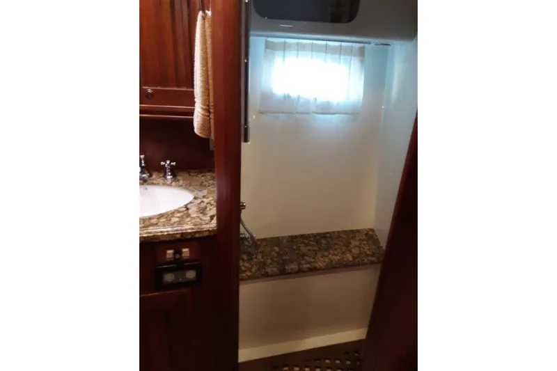 Endless Summer Yacht Photos Pics Day Head shower accessed by the forward VIP stateroom and common area