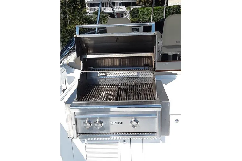 Endless Summer Yacht Photos Pics Stainless steel grill on Flybridge, perfect for outdoor cooking.