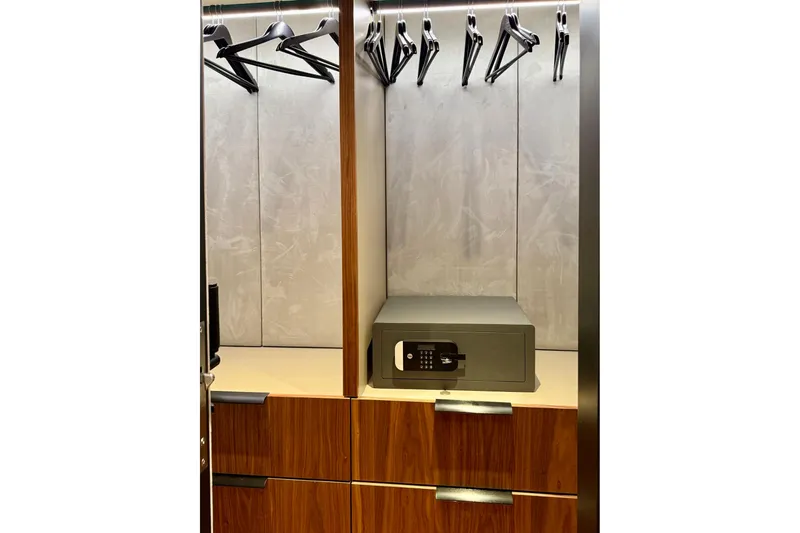 Serenity Yacht Photos Pics Luxury yacht Sunreef 60 (2024) closet with safe and hangers.