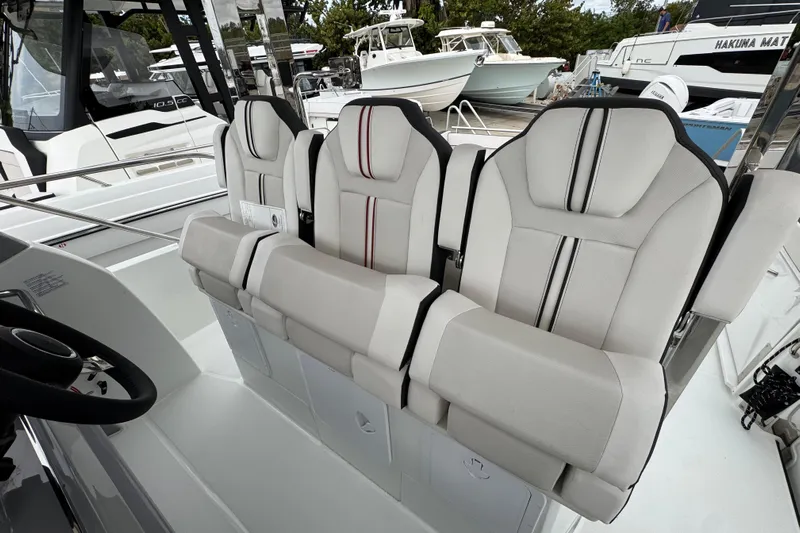 Yacht Photos Pics 2025 Jeanneau Leader 10.5 WA Series 2 boat interior with three luxurious seats.