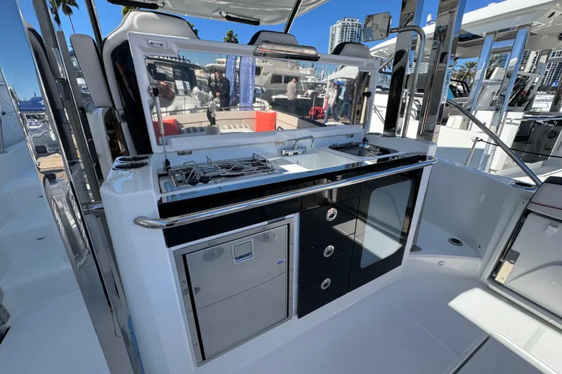  Yacht Photos Pics 2025 Jeanneau Leader 10.5 WA Series 2 boat kitchen with modern amenities.