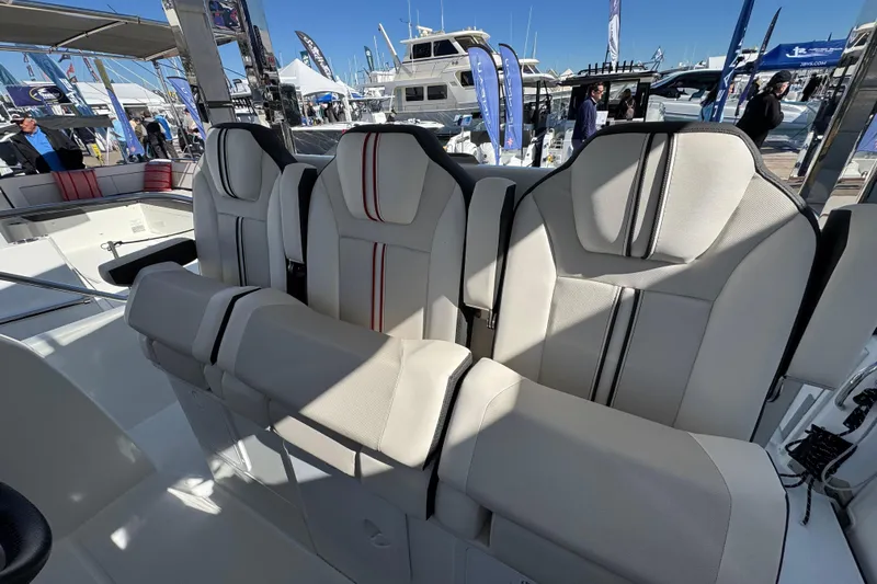  Yacht Photos Pics Luxury seating on 2025 Jeanneau Leader 10.5 WA Series 2 boat at marina.
