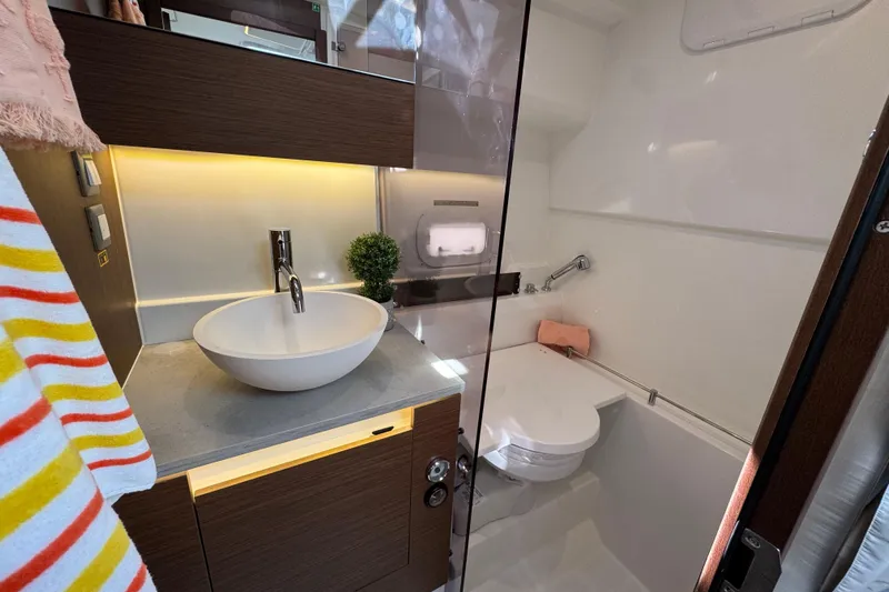  Yacht Photos Pics 2025 Jeanneau Leader 10.5 WA Series 2 bathroom with modern sink and toilet.