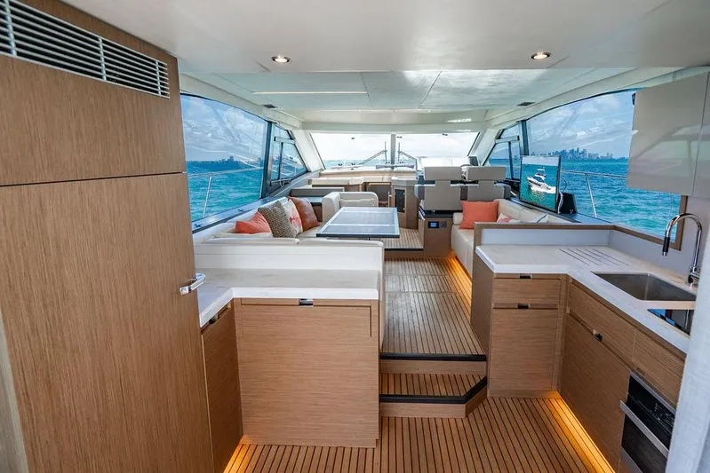 Grace Yacht Photos Pics Luxurious interior of 2022 Beneteau Monte Carlo 52 yacht with modern design and ocean view.