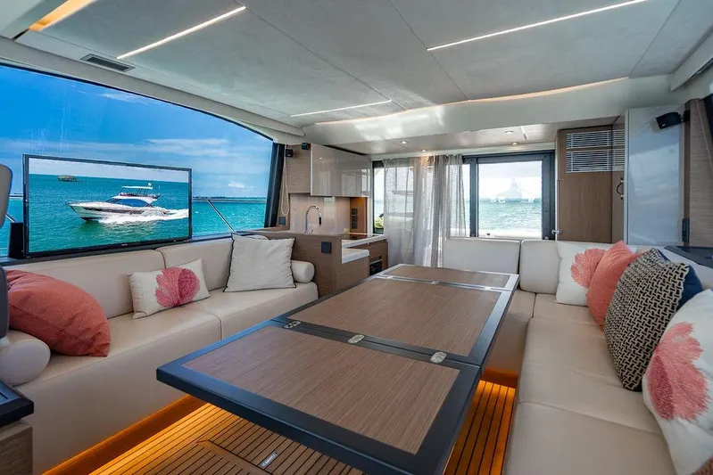 Grace Yacht Photos Pics Luxurious interior of 2022 Beneteau Monte Carlo 52 yacht with ocean view.