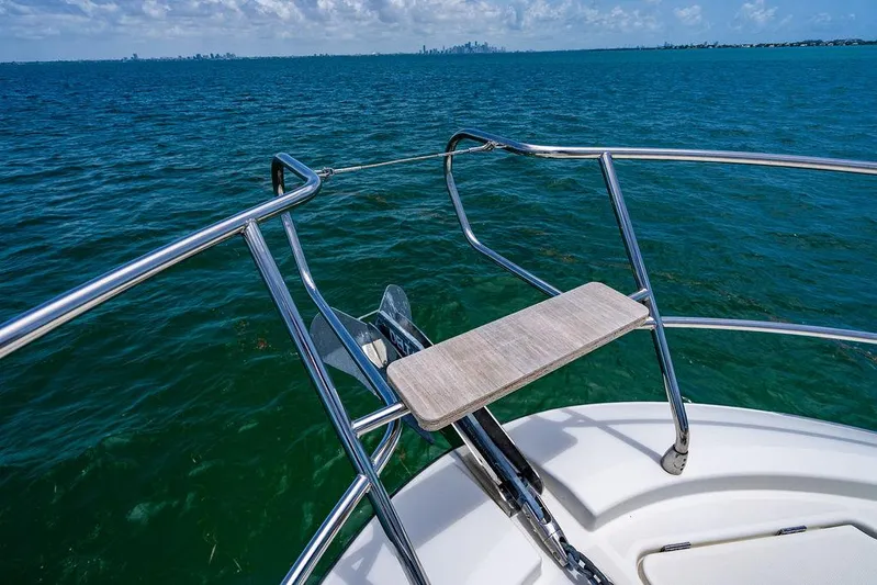 Grace Yacht Photos Pics Bow view of 2022 Beneteau Monte Carlo 52 yacht on open sea.