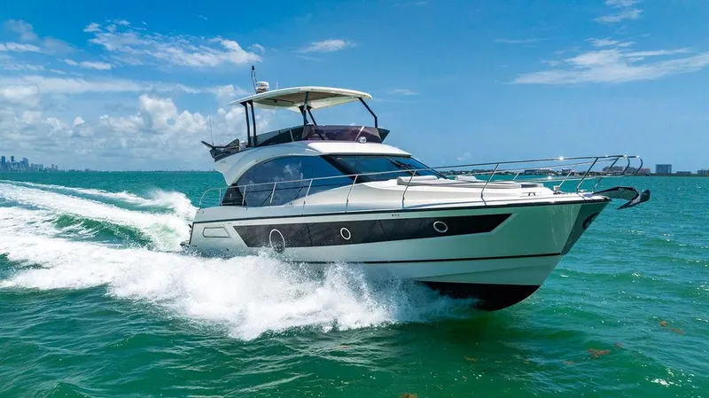 Grace Yacht Photos Pics Luxury 2022 Beneteau Monte Carlo 52 yacht cruising on open water.