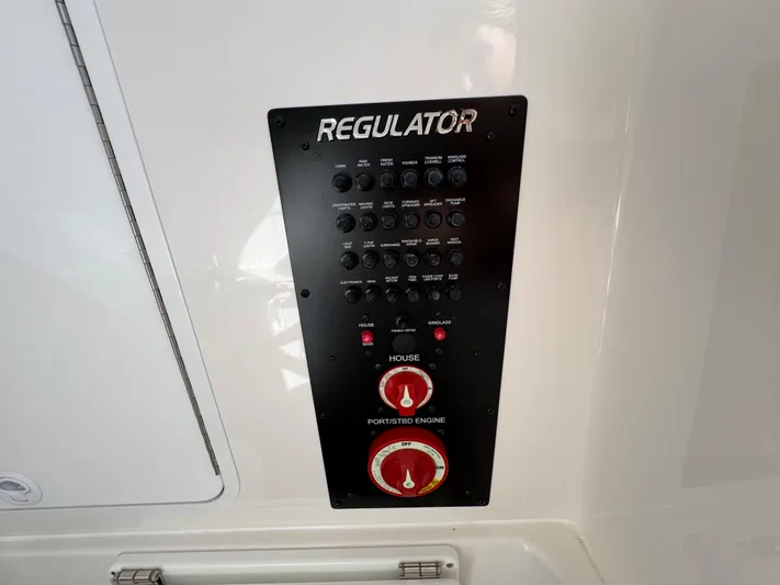  Yacht Photos Pics Control panel of 2025 Regulator 31 boat with switches and dials.