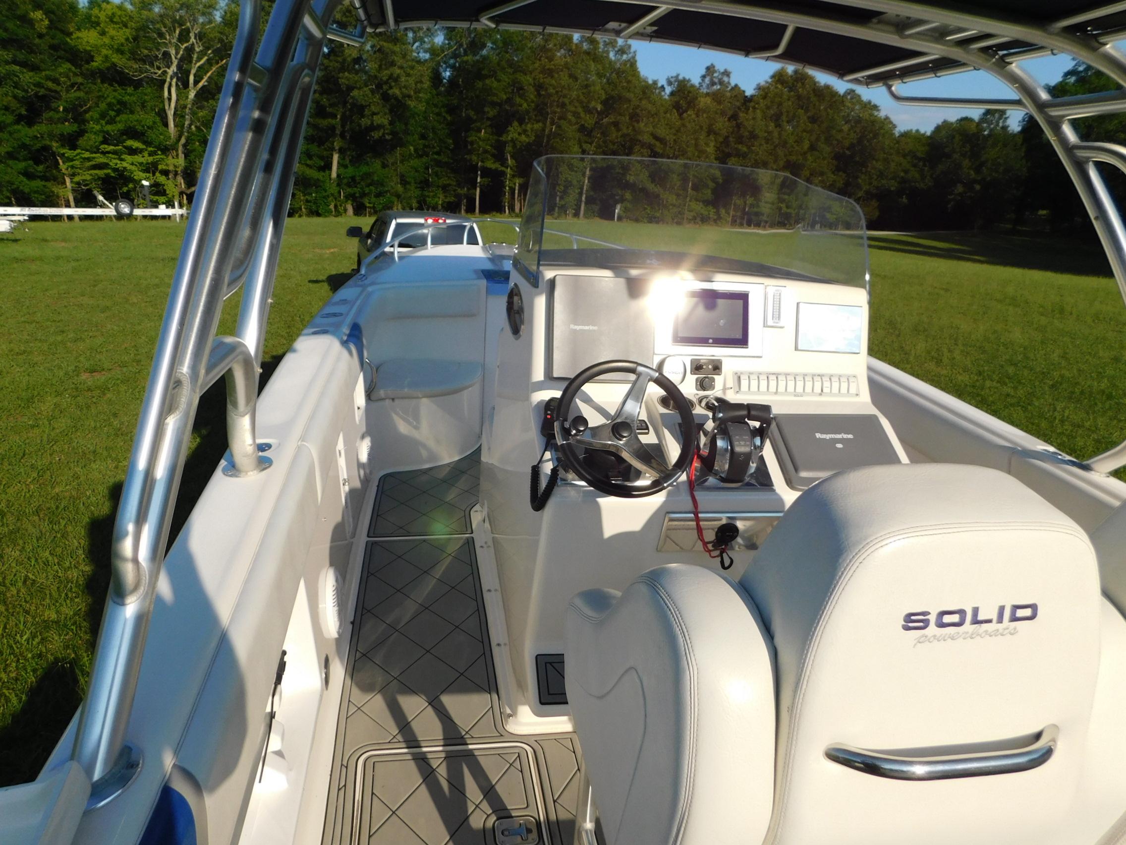 Solid Craft LIMITED 40 boat interior, 2005 model, featuring steering wheel and control panel.