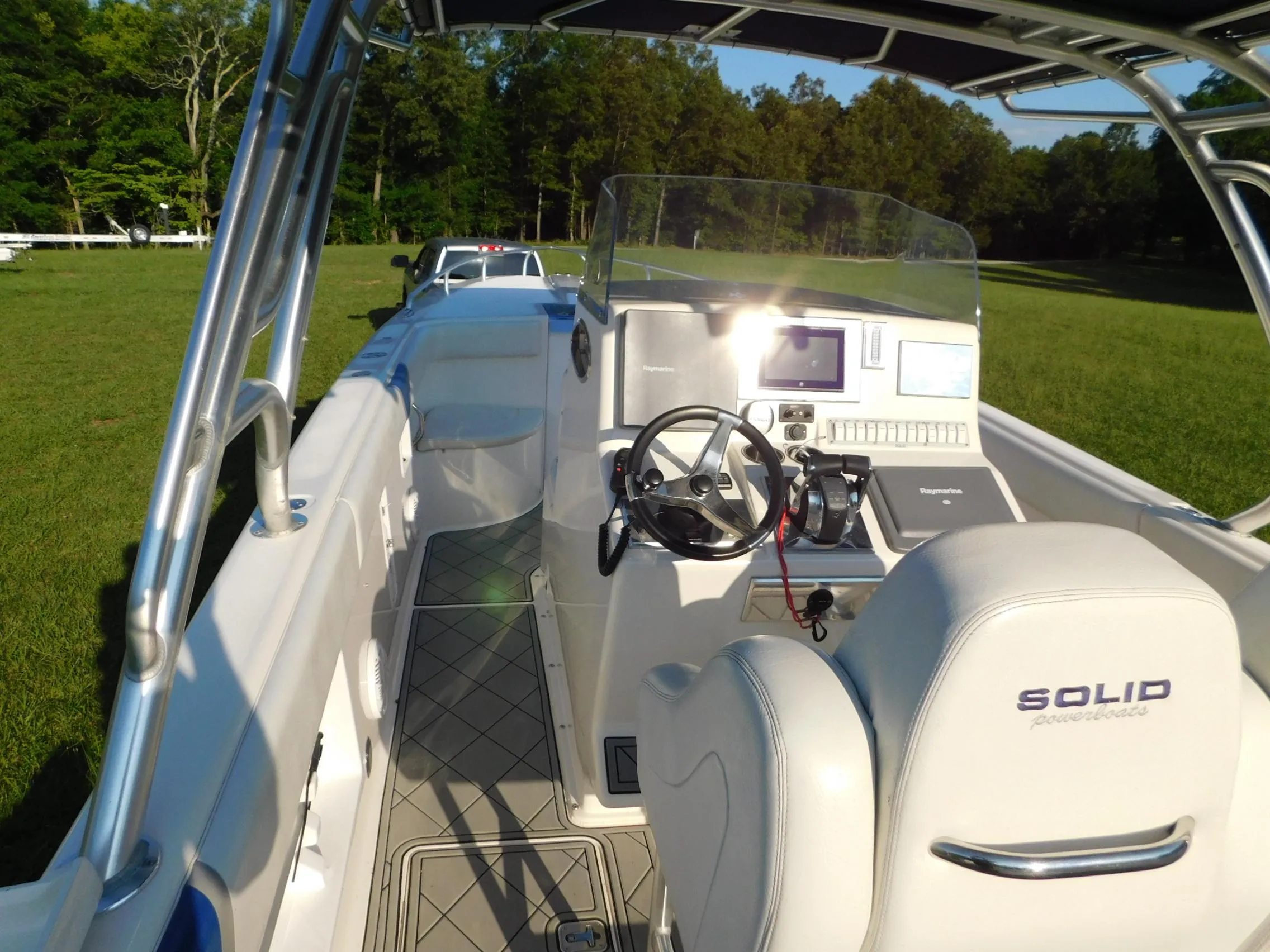 Solid Craft LIMITED 40 boat interior, 2005 model, featuring steering wheel and control panel.