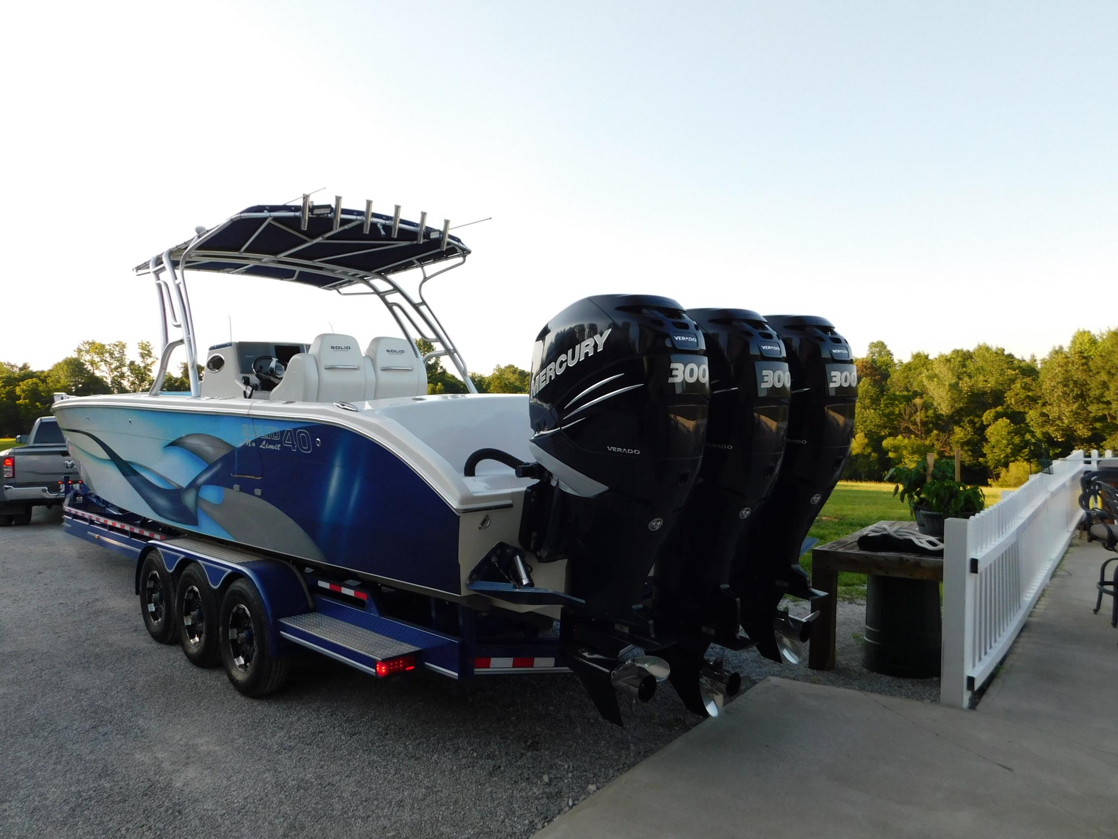 2005 Solid Craft LIMITED 40 boat with four Mercury 300 engines on a trailer.