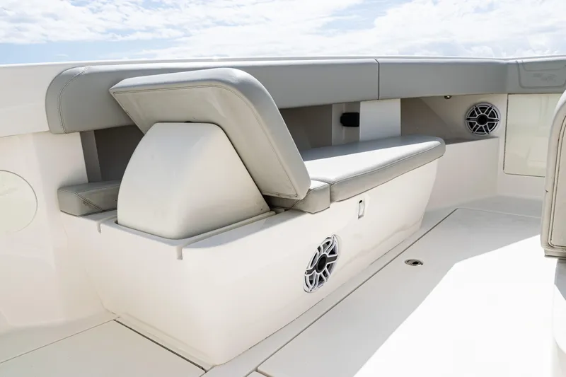  Yacht Photos Pics 2022 SeaVee 370z boat interior with cushioned seating and built-in speakers.