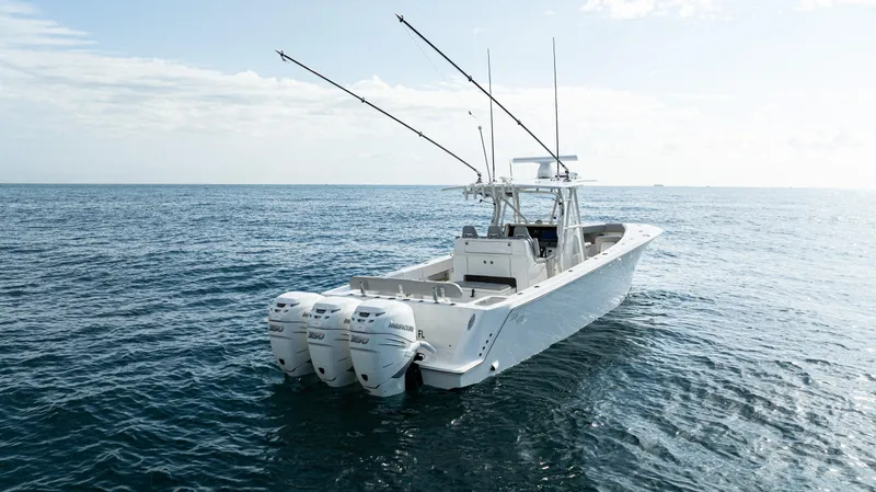  Yacht Photos Pics 2022 SeaVee 370z boat with triple engines on open sea.
