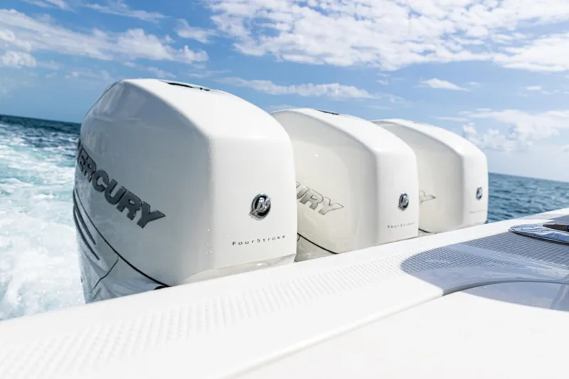  Yacht Photos Pics Triple Mercury outboard engines on a 2022 SeaVee 370z boat in open water.