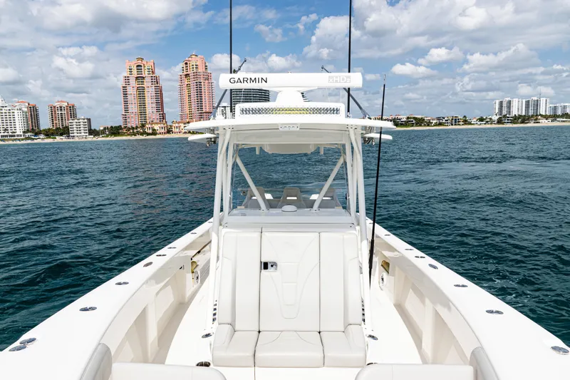  Yacht Photos Pics 2022 SeaVee 370z boat on water with city skyline in background.