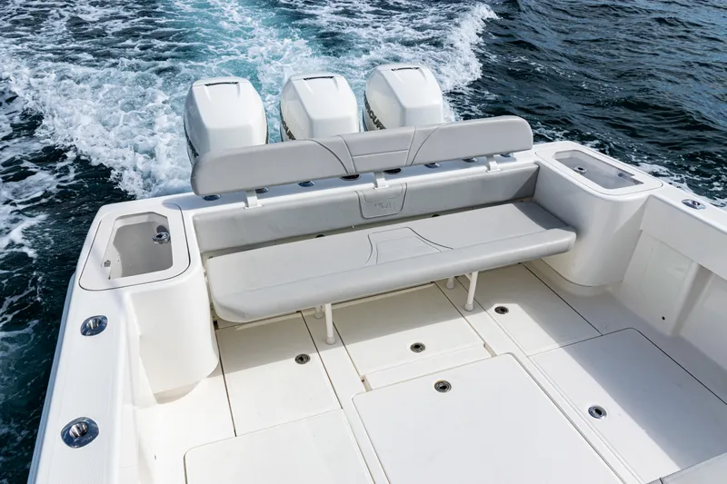  Yacht Photos Pics 2022 SeaVee 370z boat with triple engines, spacious deck, and comfortable seating.