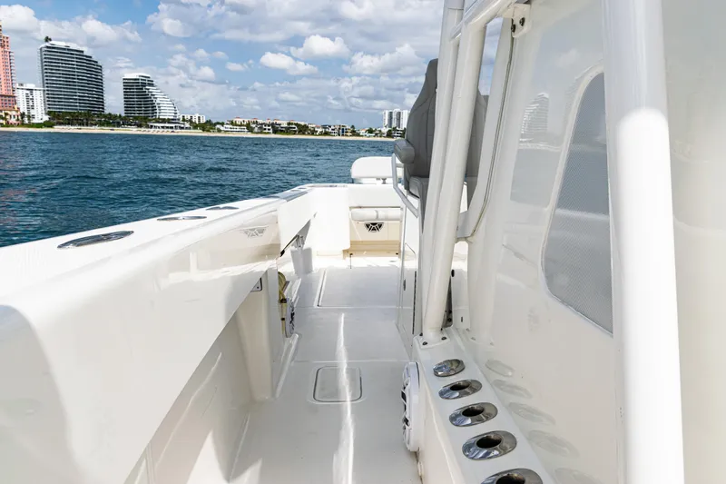  Yacht Photos Pics 2022 SeaVee 370z boat on water with city skyline in background.