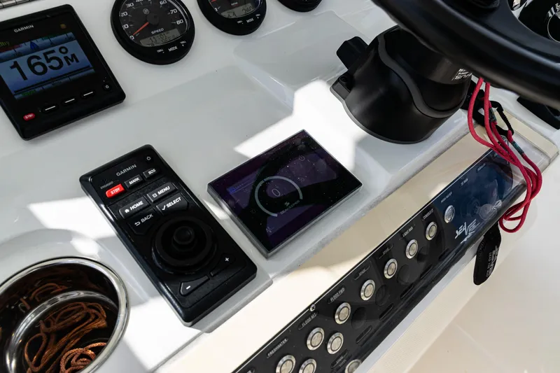  Yacht Photos Pics Control panel of 2022 SeaVee 370z boat with navigation instruments and gauges.