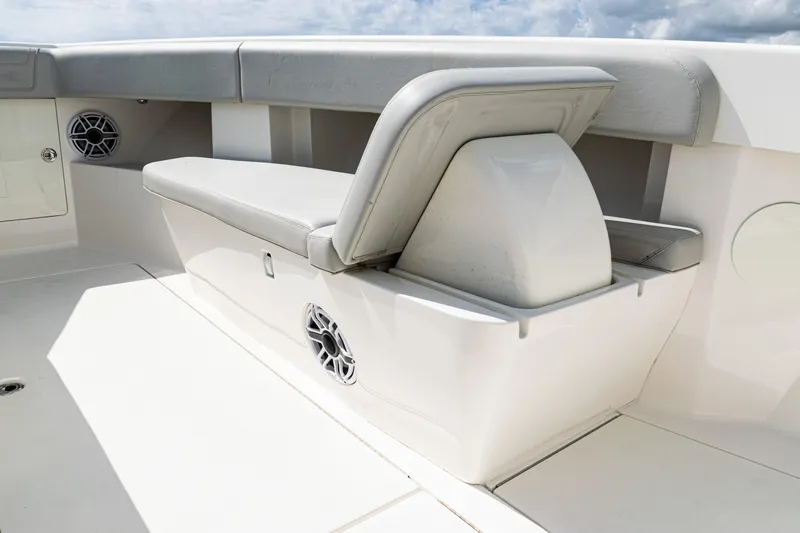  Yacht Photos Pics 2022 SeaVee 370z boat interior with cushioned seating and built-in speakers.