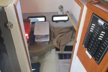  Yacht Photos Pics 2021 Ranger Tugs R-31 CB cabin interior with storage and control panel.