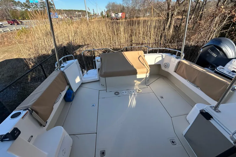  Yacht Photos Pics 2021 Ranger Tugs R-31 CB boat deck with seating and Yamaha engine.