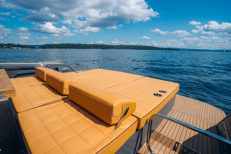 Delilah Yacht Photos Pics 2024 Pardo Yachts 43 with sun loungers on deck, overlooking serene blue waters.