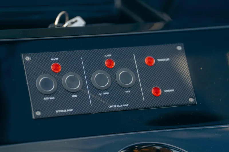 Delilah Yacht Photos Pics Control panel of 2024 Pardo Yachts 43 with buttons and indicators.